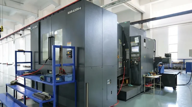 Dynamic balancing machine for high-speed servo motor shafts